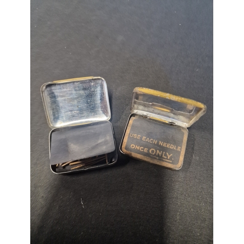 228 - Two vintage tape tins of gramophone needles by Regal and Songster.