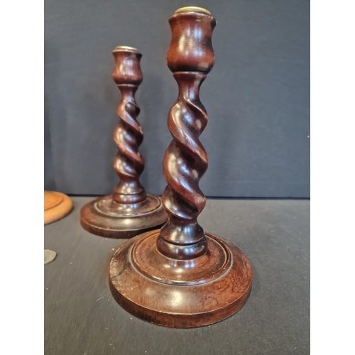 232 - Two pairs of oak candles. One with Barley twist design