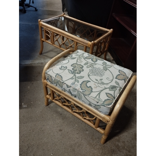 239 - Cane Glass Top Table and Footstool. Table Approx. 48H x 80W x 48D cm.