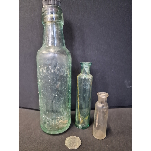 274 - A collection of glass.vintage marbles and bottles