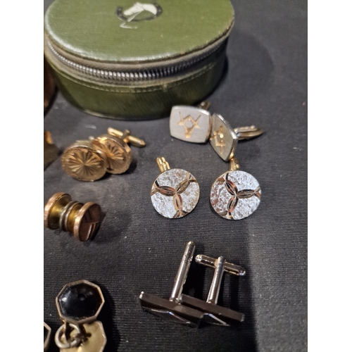 281 - A selection of vintage cuff links with two zipped storage cases