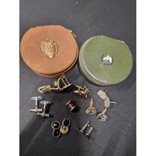 281 - A selection of vintage cuff links with two zipped storage cases