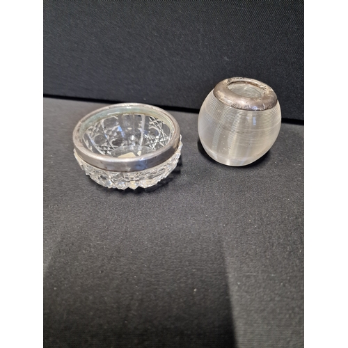 282 - Two vintage silver topped trinket dish and Candel holder. Trinket dish has hallmark stamps .