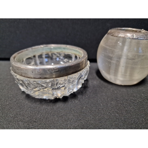 282 - Two vintage silver topped trinket dish and Candel holder. Trinket dish has hallmark stamps .