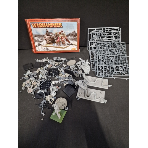 294 - A collection of warhammer spares parts and Caracters.  Included warhammer Skrag The Slaughterer - ne... 