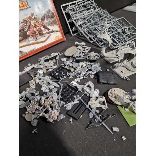 294 - A collection of warhammer spares parts and Caracters.  Included warhammer Skrag The Slaughterer - ne... 