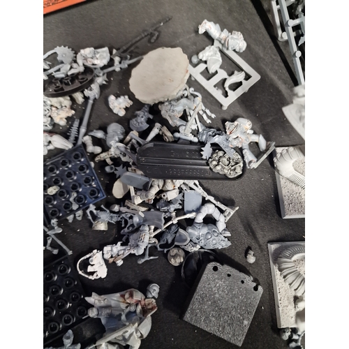 294 - A collection of warhammer spares parts and Caracters.  Included warhammer Skrag The Slaughterer - ne... 