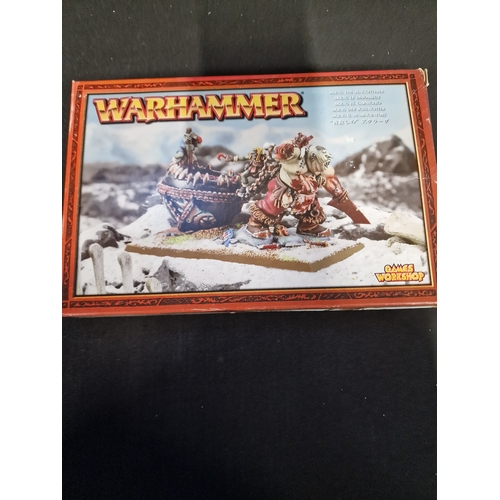 294 - A collection of warhammer spares parts and Caracters.  Included warhammer Skrag The Slaughterer - ne... 