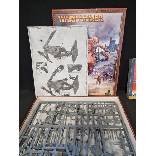 307 - Two warhammer 40,000 Citadel figures.  Giant and Choas space marine warpsmith