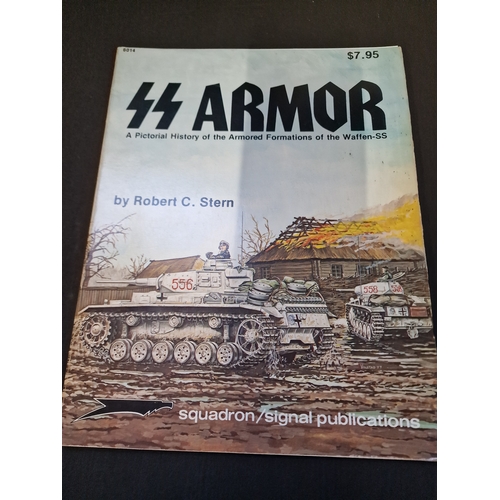 311 - Four model army tanks books.