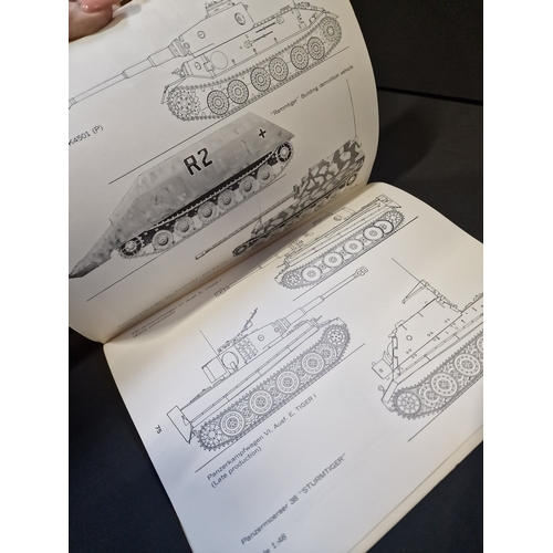 311 - Four model army tanks books.