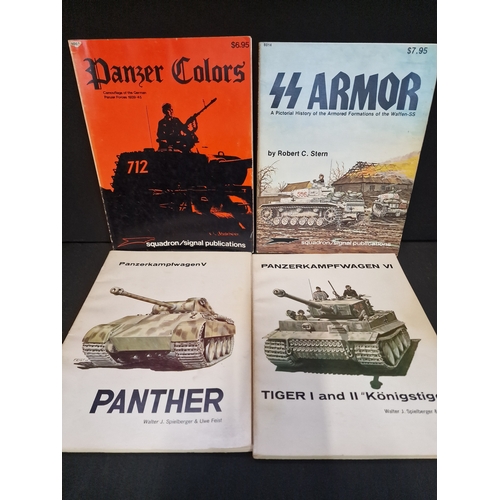 311 - Four model army tanks books.