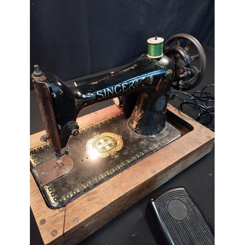 325 - Vintage Electric Singer Sewing Machine with Light. Tested for Power.