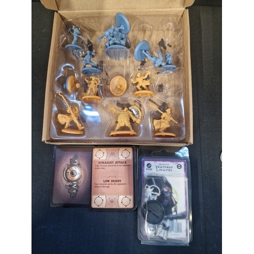 343 - A selection of Guild Ball game characters, game deck of cards and The Union Fractured Loyalties figu... 