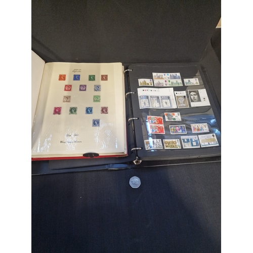 357 - Two Great Britain stamp albums with some.mint, used and with rand plate numbers.  Various dates