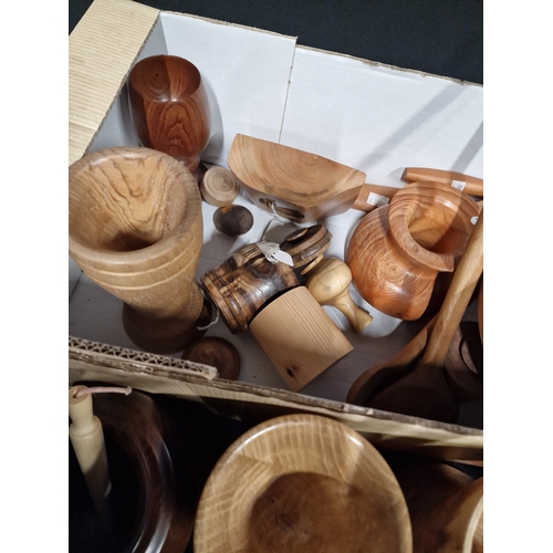 384 - A large selection of hand turned wooden items. Various woods, sizes and designs