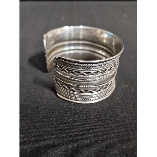 388 - A wide continental silver wrist cuff