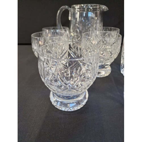 4 - A collection of cut glass cystal includes give tumbler glasses and jug and Cristal D'Arques Cassandr... 