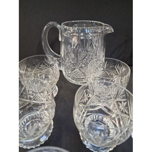 4 - A collection of cut glass cystal includes give tumbler glasses and jug and Cristal D'Arques Cassandr... 