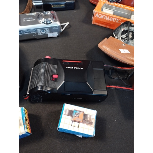 29 - Selection of Retro and Vintage Cameras and Equipment. Inc Nikon, Kodak, Canon, Agfamatic and two Mic... 