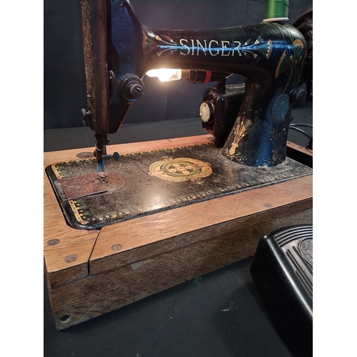 53 - Vintage Electric Singer Sewing Machine with Light. Tested for Power.