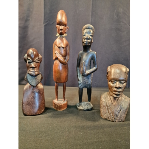 121 - Four pieces of wooden Africana.  Three males and one female