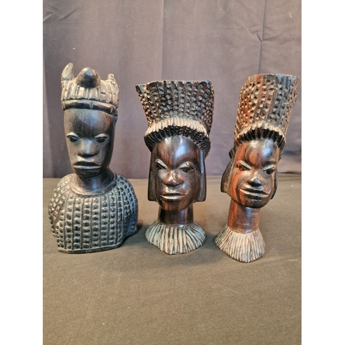 122 - Three African wooden heads