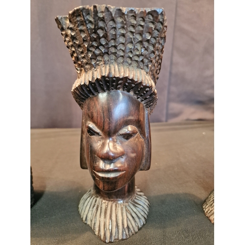 122 - Three African wooden heads