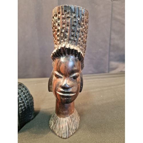 122 - Three African wooden heads