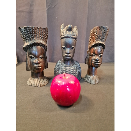 122 - Three African wooden heads