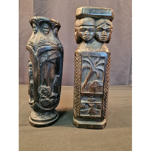 123 - Two African carved Ebony candle holders