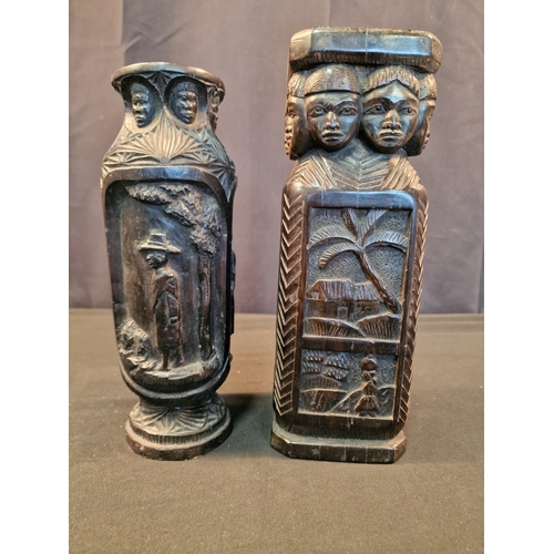 123 - Two African carved Ebony candle holders