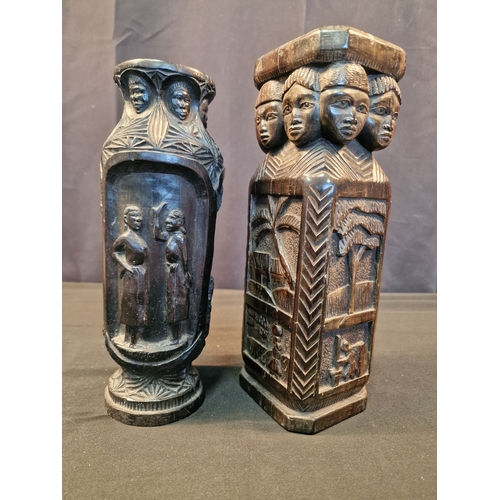 123 - Two African carved Ebony candle holders