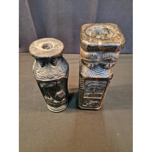 123 - Two African carved Ebony candle holders