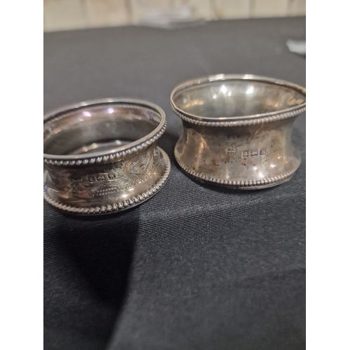 390 - Two sterling silver napkin rings Birmingham hallmarks. 14.7g approximately