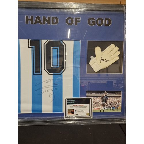 391 - A Hand of God framed 1986 Argentina World Cup Jersey number 10. Signed September 2019 by Diego Marad... 