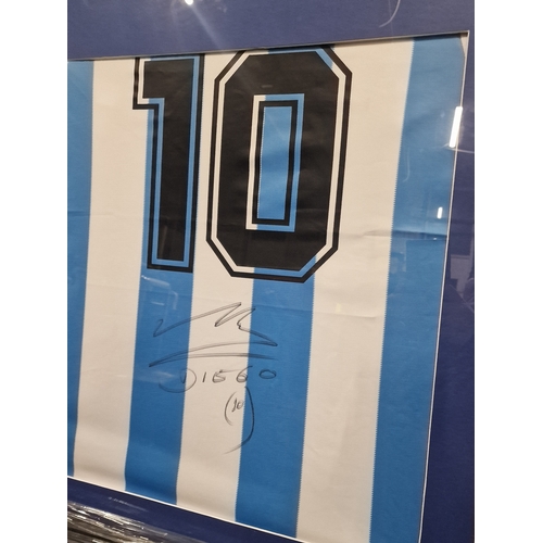 391 - A Hand of God framed 1986 Argentina World Cup Jersey number 10. Signed September 2019 by Diego Marad... 