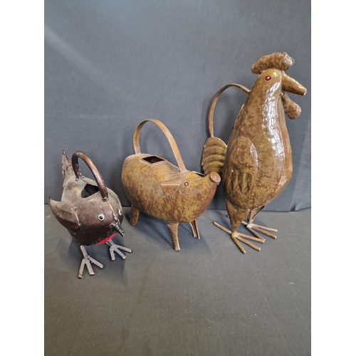 Three 1960's metal animal watering cans. Chicken, pig and bird.