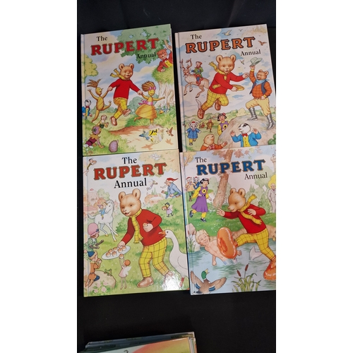 6 - A collection of 15 Rupert Annuals numbers 55 to 69 (inclusive) year 1990 to 2004