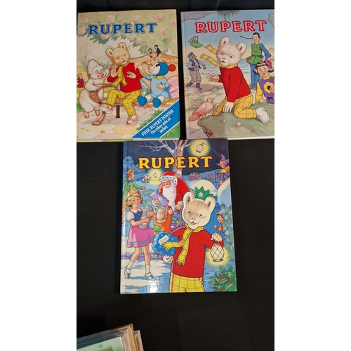 6 - A collection of 15 Rupert Annuals numbers 55 to 69 (inclusive) year 1990 to 2004