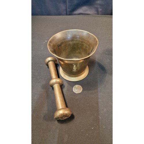 1 - A heavy brass pestle and Mortar