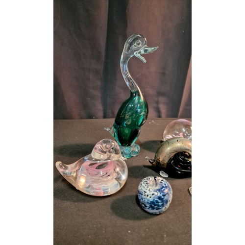 30 - A collection of Caithness, Selkirk and Murano paper weights and glass ware.