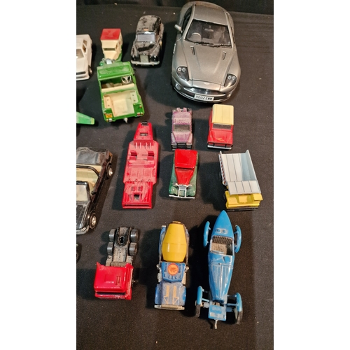 35 - A collection of 24 Corgi, matchbox and various other brands of car trucks and vans