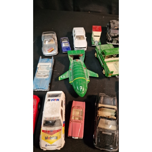 35 - A collection of 24 Corgi, matchbox and various other brands of car trucks and vans