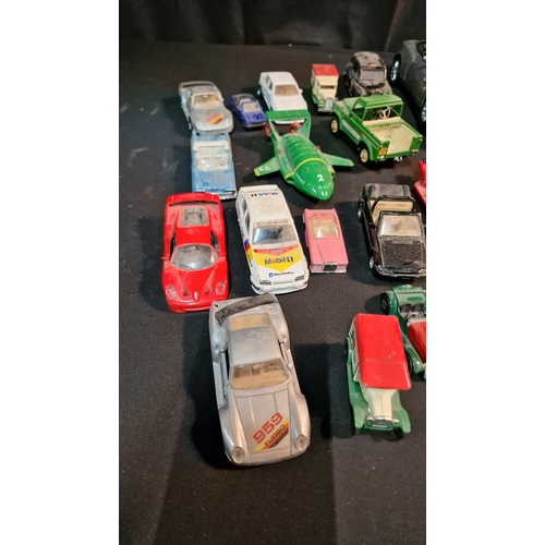 35 - A collection of 24 Corgi, matchbox and various other brands of car trucks and vans