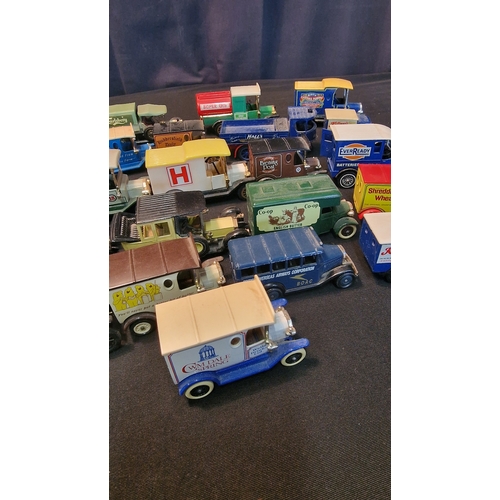 55 - A selection of 20 matchbox, Lledo and days gone advertising vans