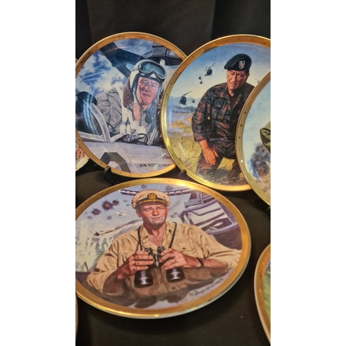 58 - John Wayne collectors lot.  Includes two kohn Wayne ornaments.  Eight collectors collectable plates ... 