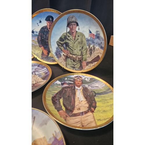 58 - John Wayne collectors lot.  Includes two kohn Wayne ornaments.  Eight collectors collectable plates ... 