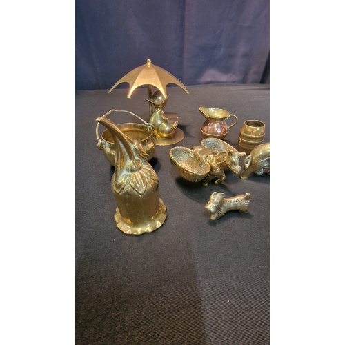 67 - An assortment of miniature brasses.