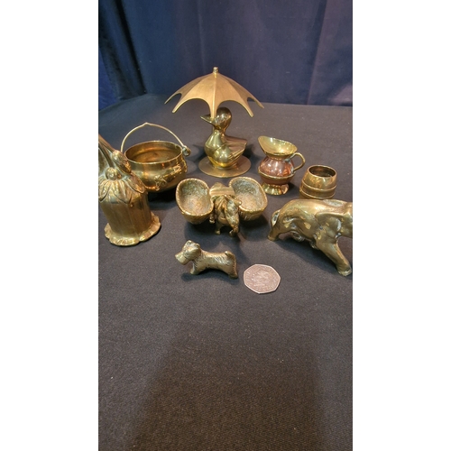 67 - An assortment of miniature brasses.